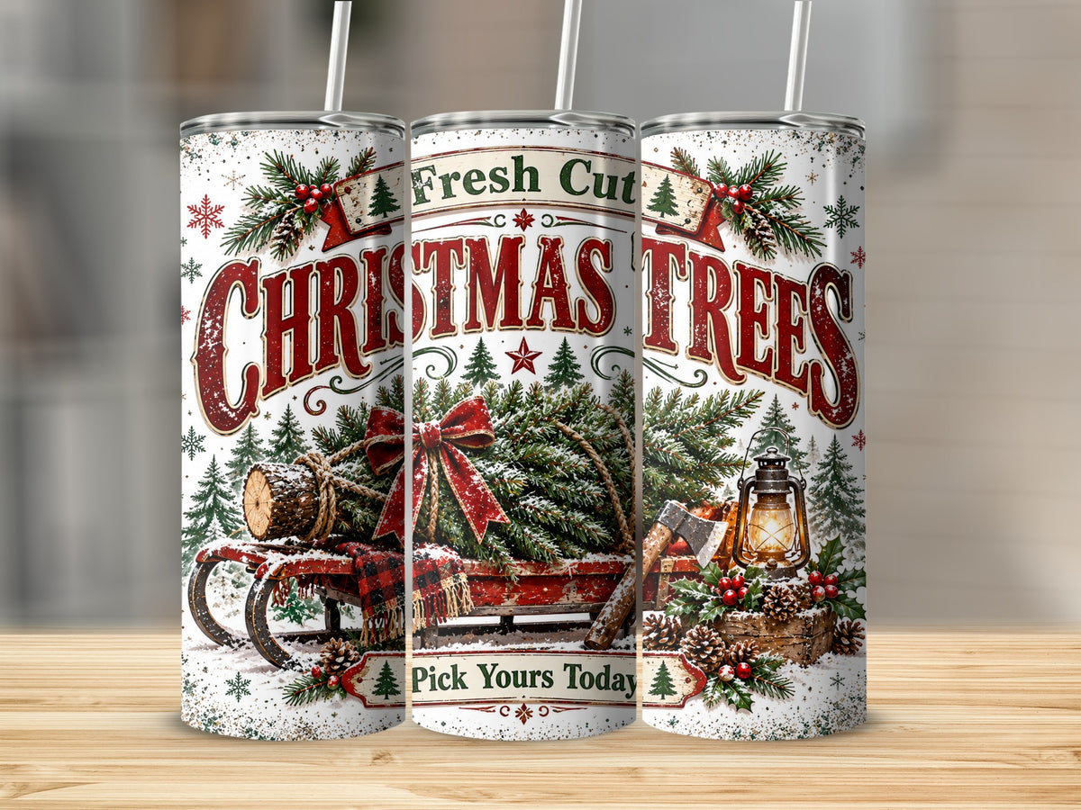 Three metal travel tumblers with straws feature a vintage Fresh Cut Christmas Trees design.