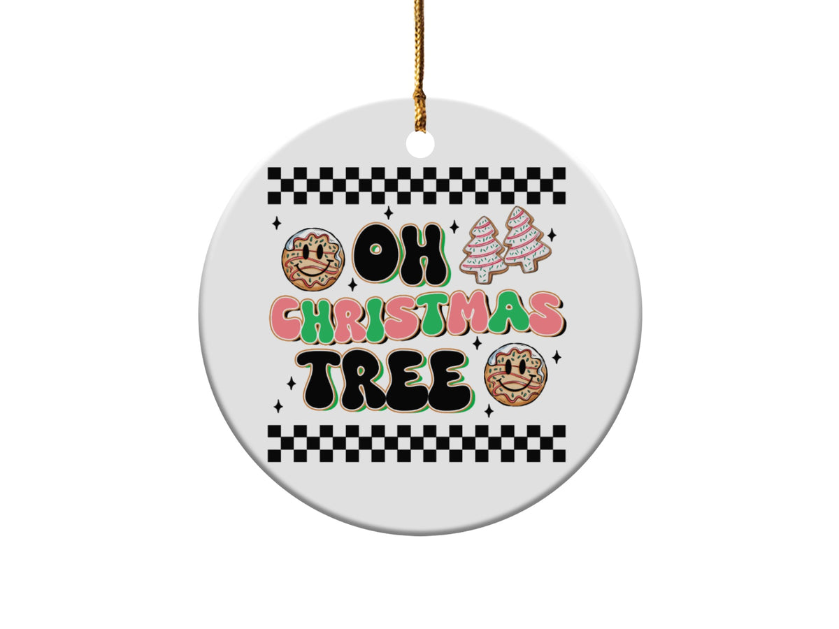 Round ornament with "Oh Christmas Tree" text, gingerbread cookies, and smiley face donuts.