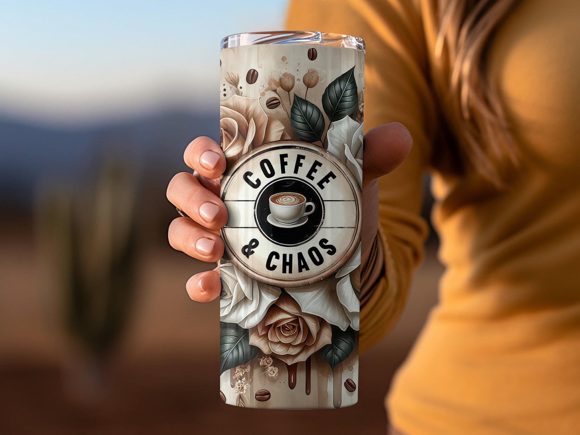 Woman holding a tumbler with roses, coffee beans, and "Coffee & Chaos" text.