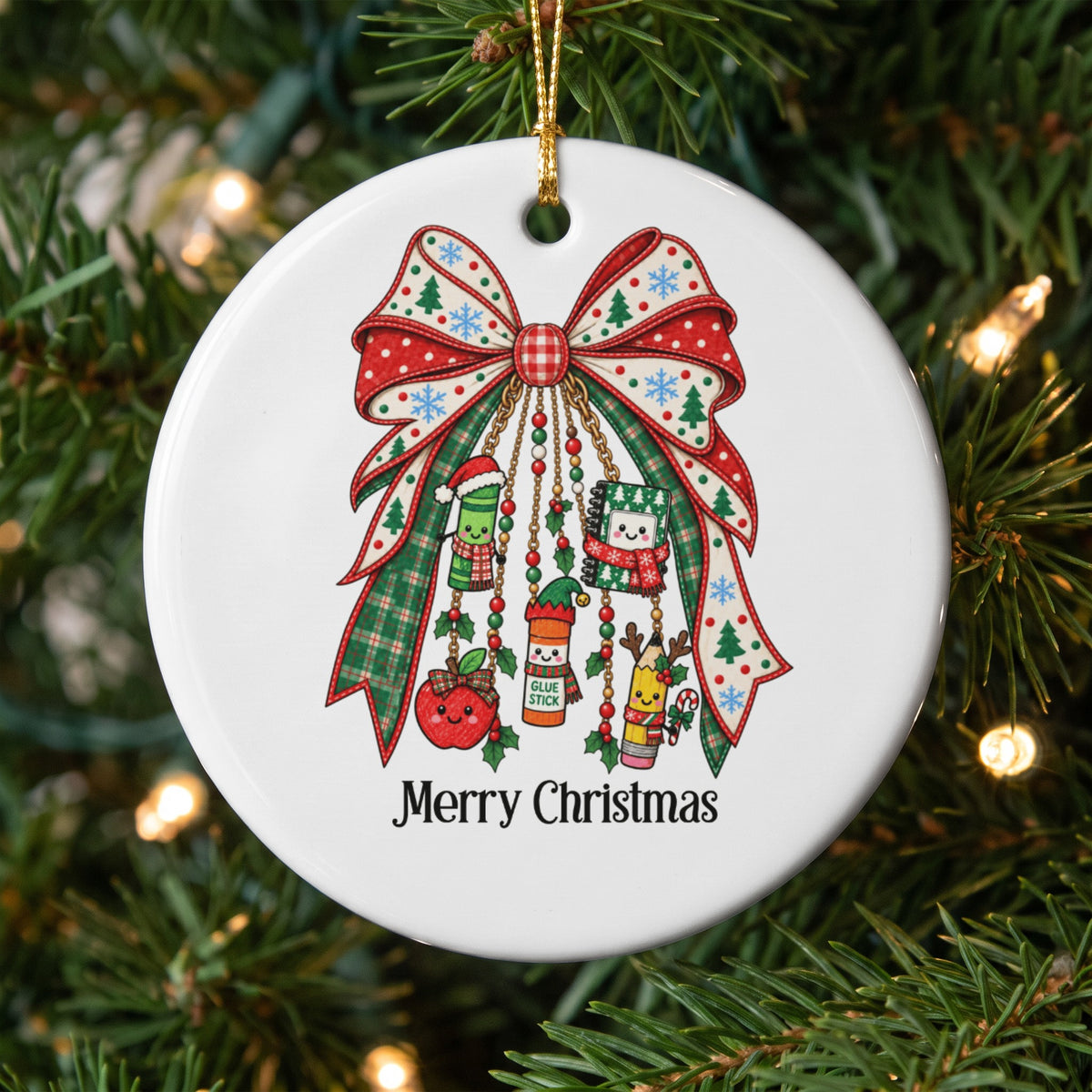 Round ornament with Christmas bow and school supplies, reads "Merry Christmas."