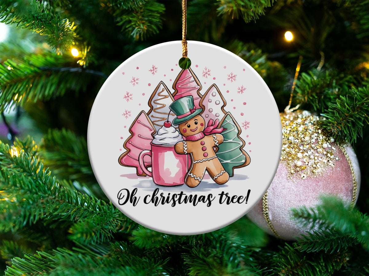 Ornament with gingerbread man, mug, and trees, saying "Oh christmas tree!"