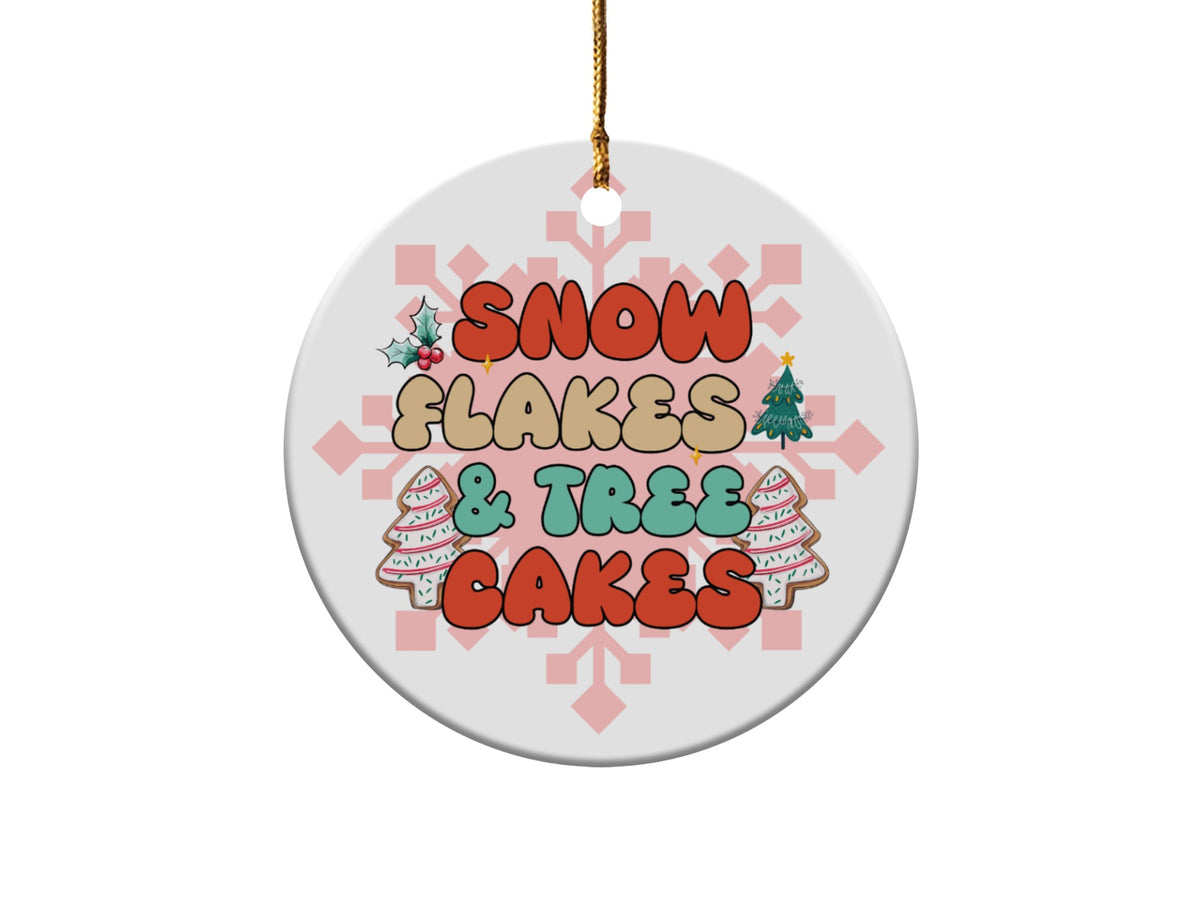Round Christmas ornament with "Snowflakes & Trees & Cakes" text and holiday graphics.