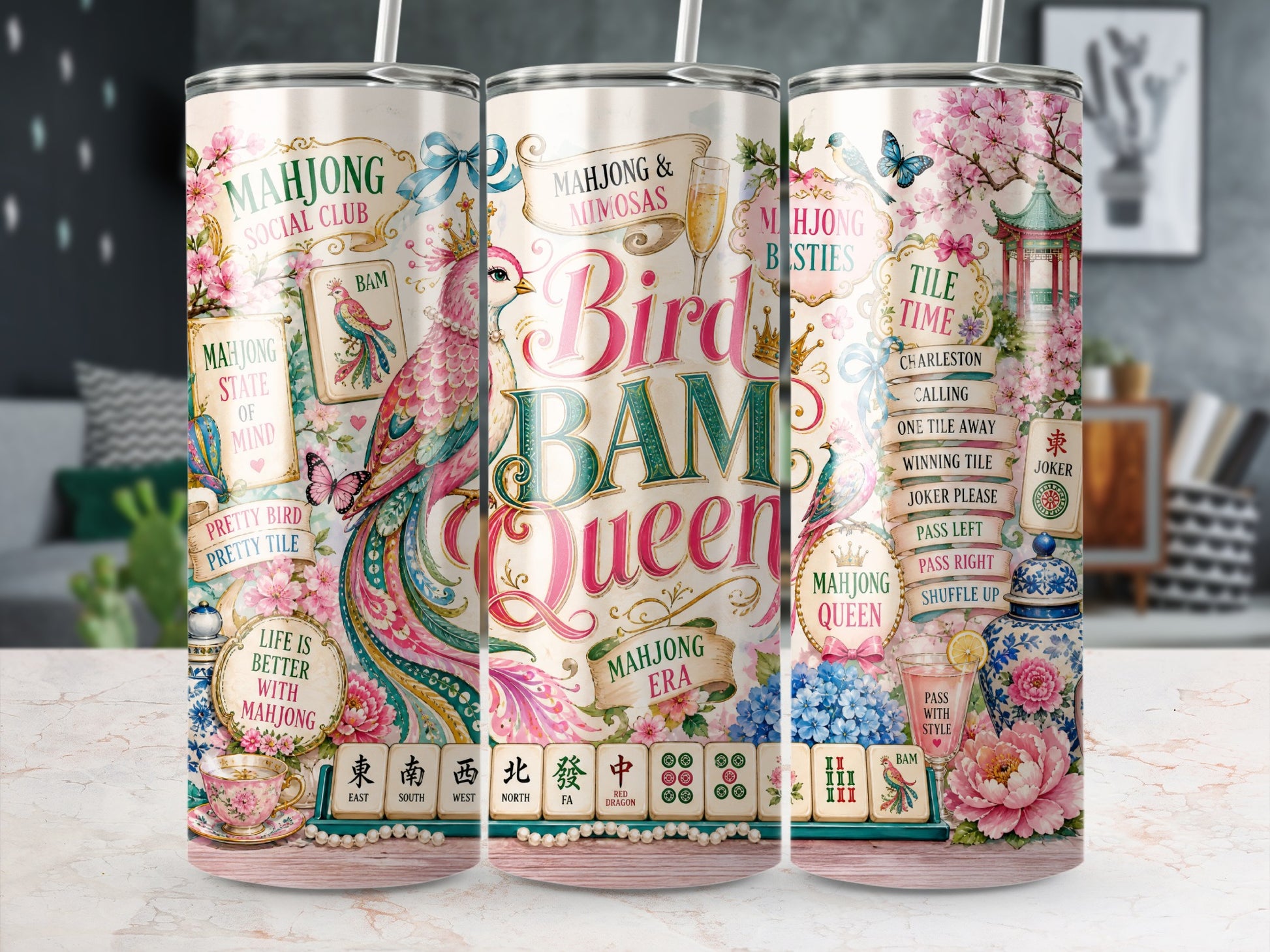 Tumbler with "Bird Bam Queen" and mahjong tile designs, featuring birds and flowers.