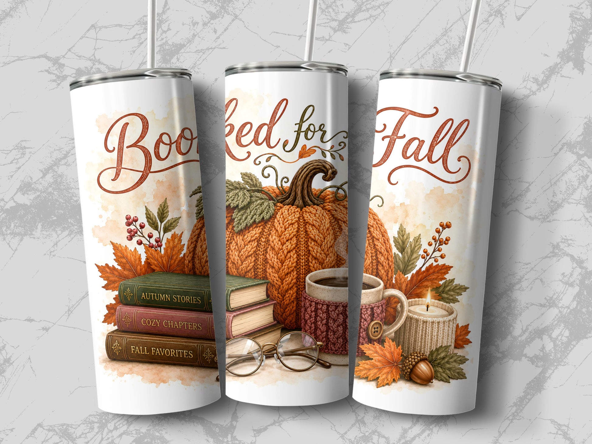 Three tumblers with fall-themed "Booked for Fall" text, pumpkins, books, coffee, and a candle.
