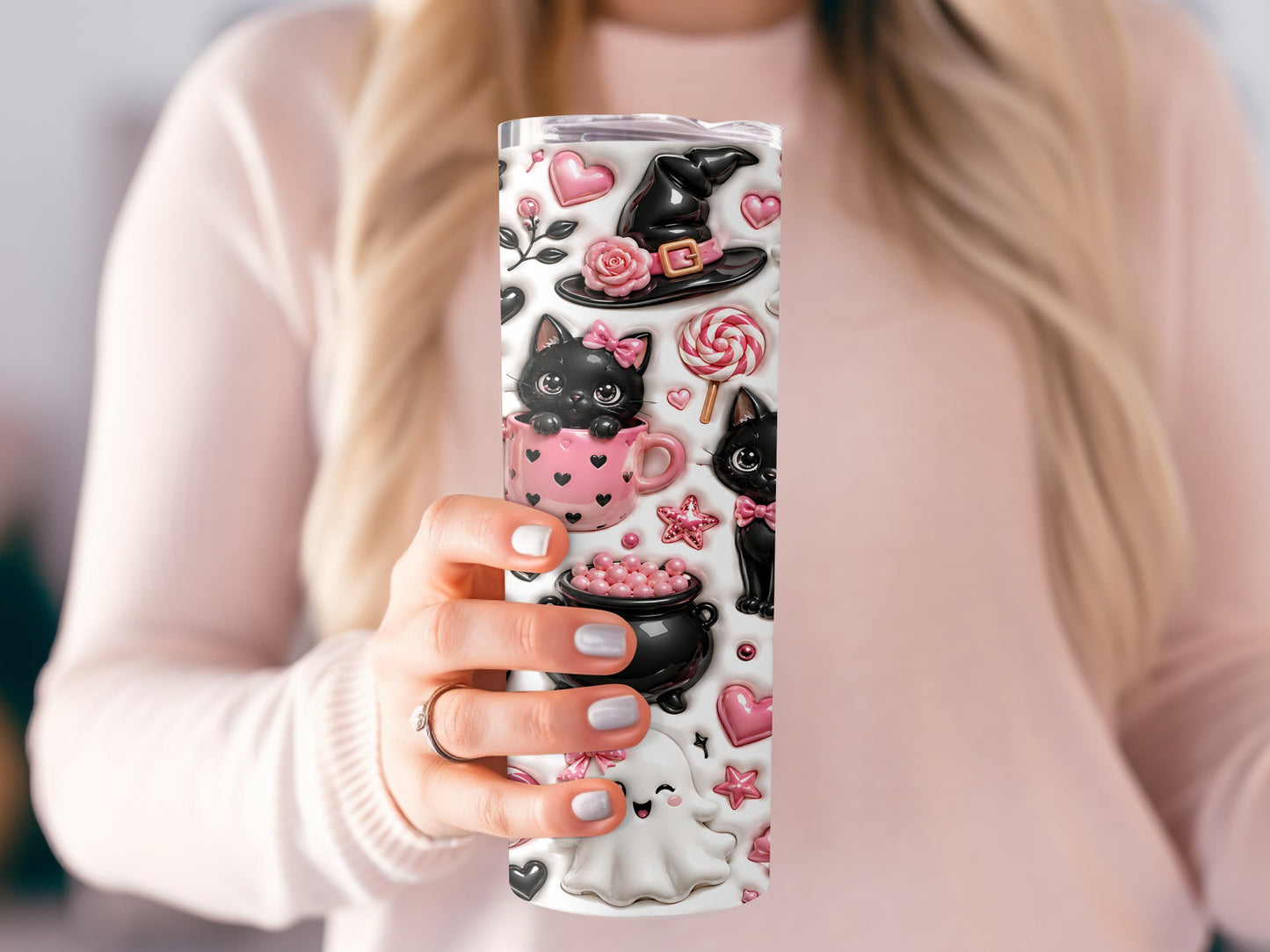 Tumbler with black cats, witch hat, cauldron, ghost, hearts, and candy pattern.