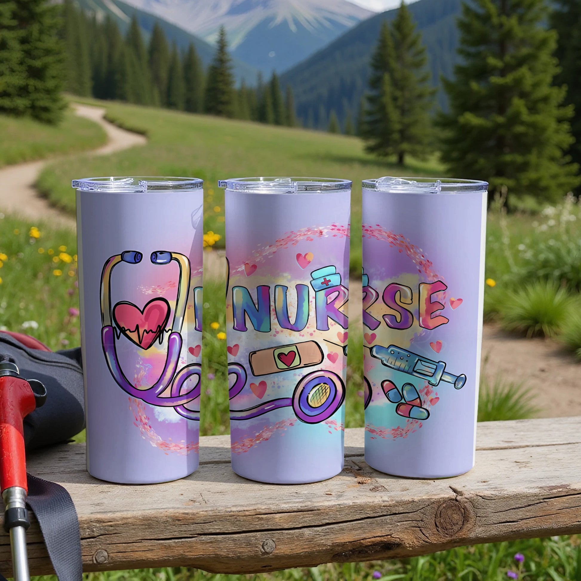 Three nurse-themed tumblers with stethoscope, heart, and medical symbols.