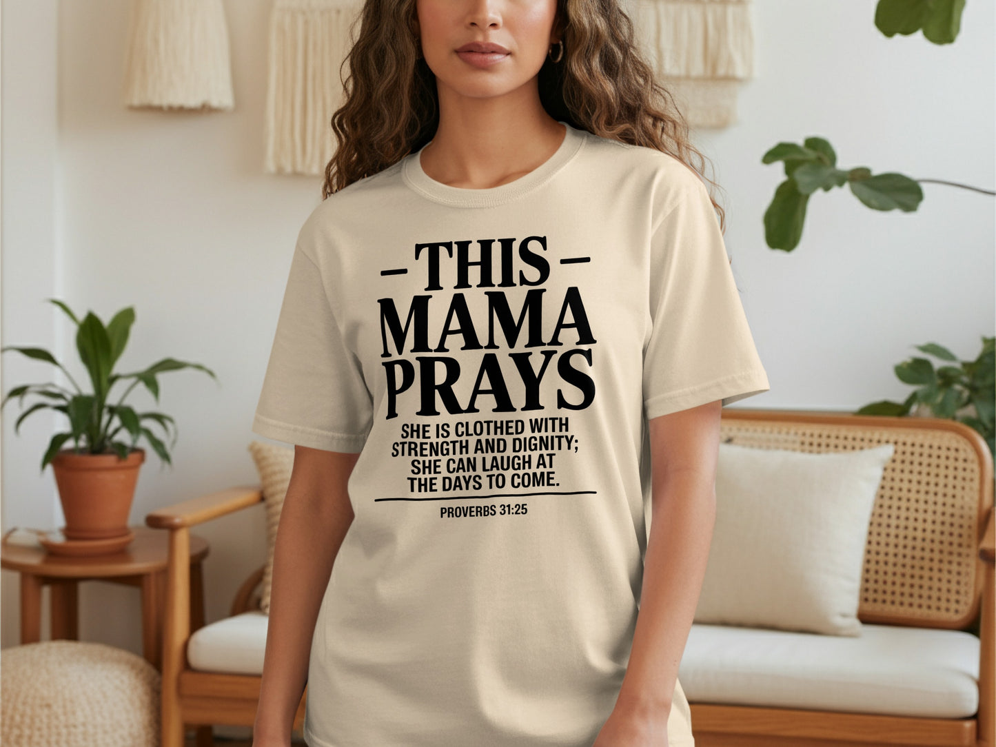 T-shirt with "This Mama Prays" text and Proverbs 31:25 verse.