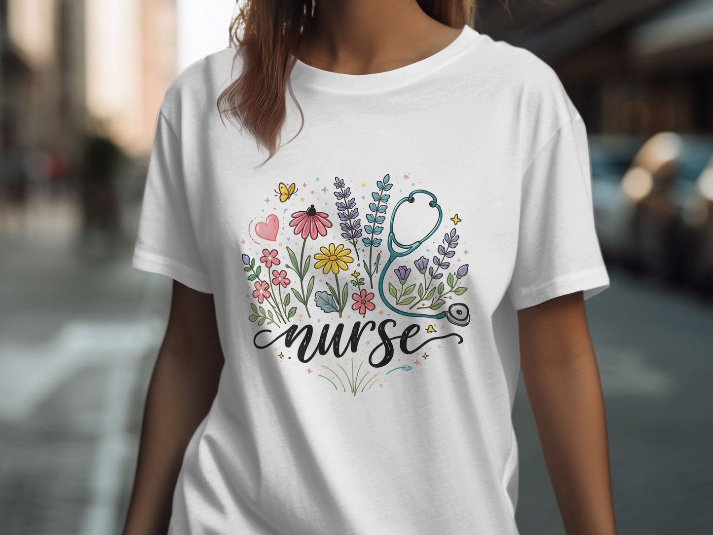White t-shirt with "Nurse" text surrounded by flowers and a stethoscope.