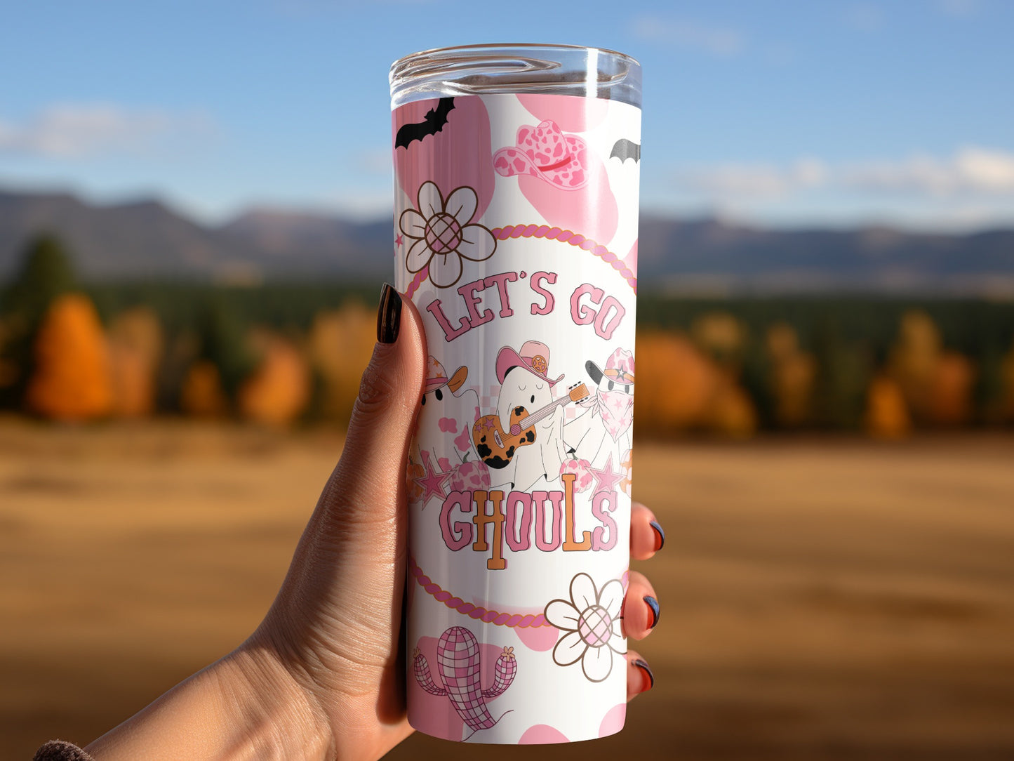 White tumbler with pastel pink and orange Halloween ghost and cactus design, reads "Let's Go Ghouls".