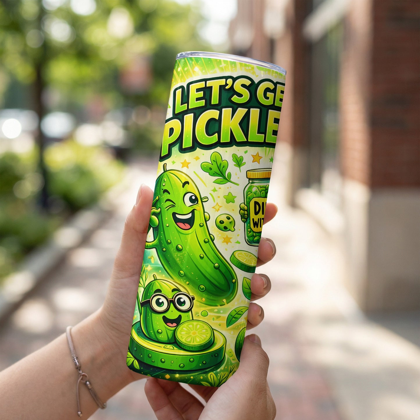 Green tumbler with "Let's Get Pickle" text and cartoon pickle character.