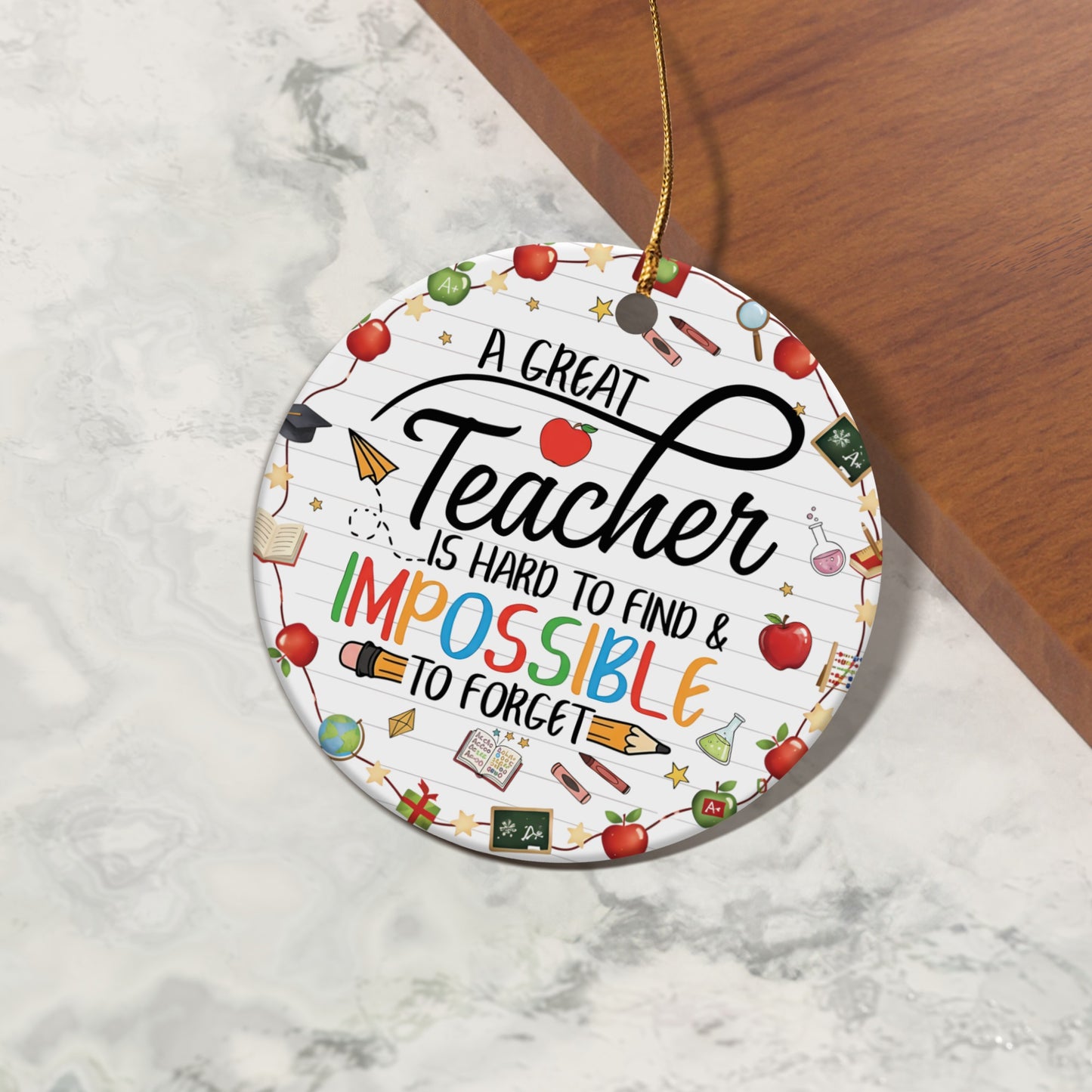 Round ornament with "A Great Teacher is Hard to Find & Impossible to Forget".