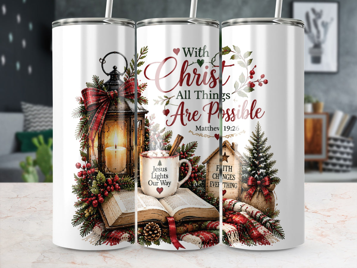 Three stainless steel tumblers display a Christmas design featuring a lantern, an open Bible, and Christian text.