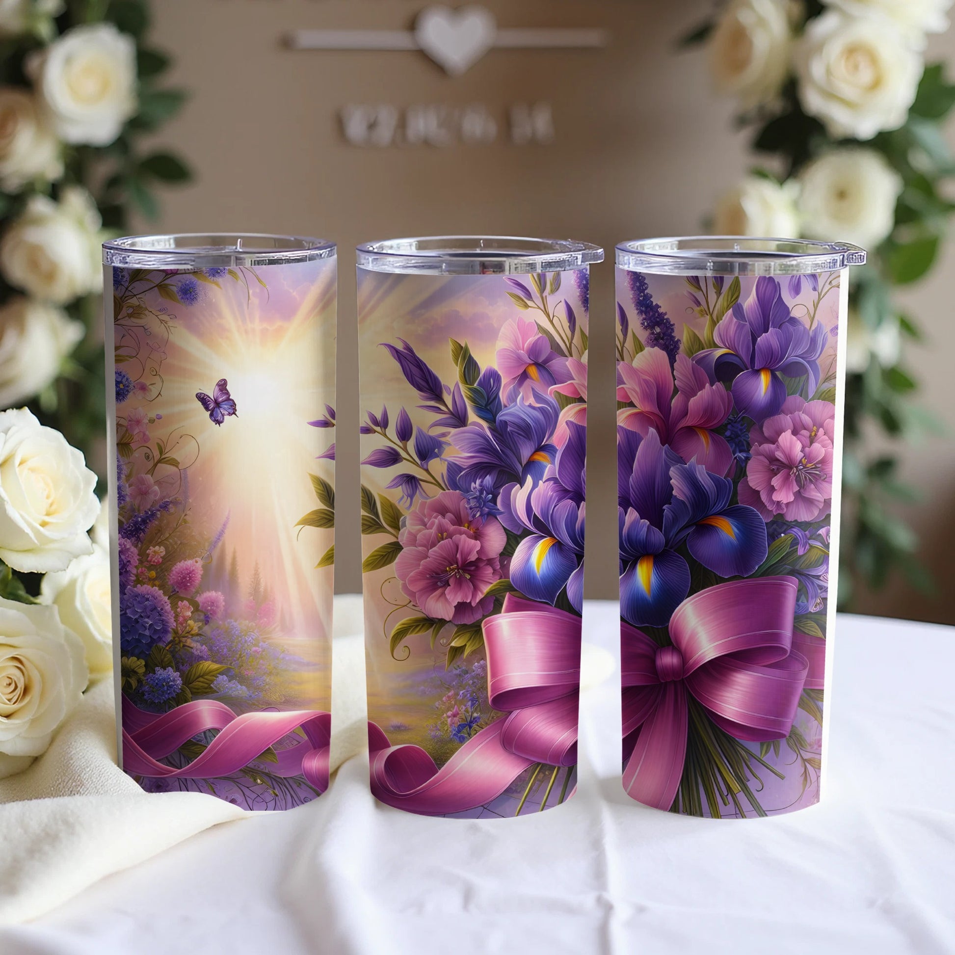 Triptych of tumblers with floral designs and ribbon accents, a butterfly in sunlight.