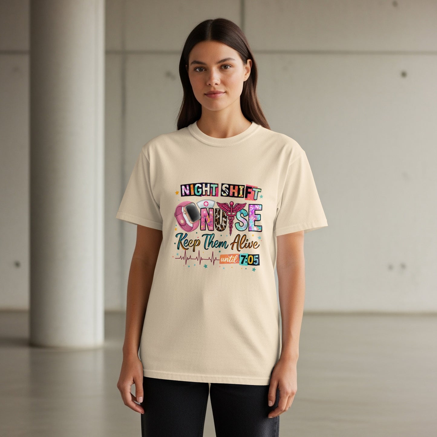 Cream t-shirt with "Night Shift Nurse Keep Them Alive Until 7:05" graphic.