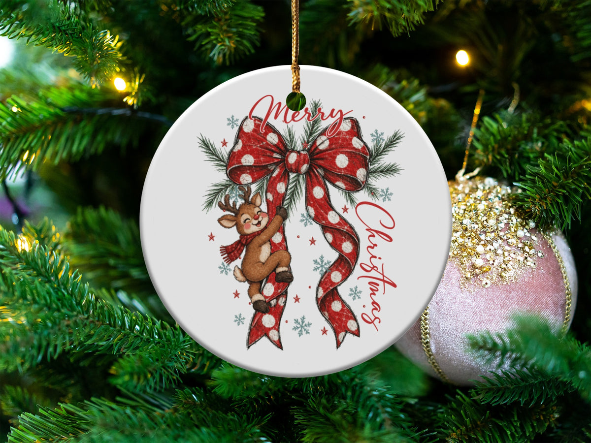 Christmas ornament with reindeer, bow, and "Merry Christmas" text on a tree.