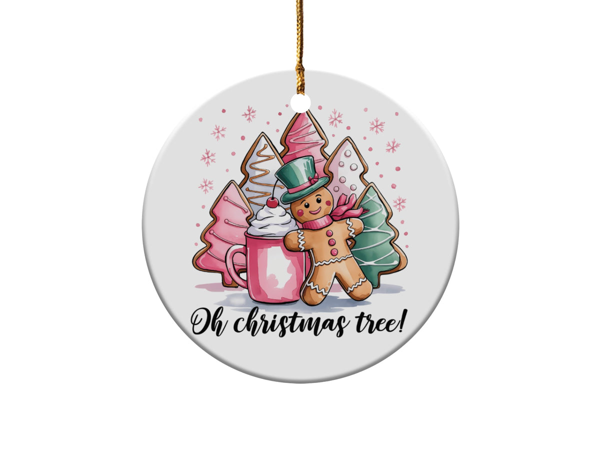Round Christmas ornament with gingerbread man, hot chocolate, and frosted trees, says "Oh Christmas tree!".