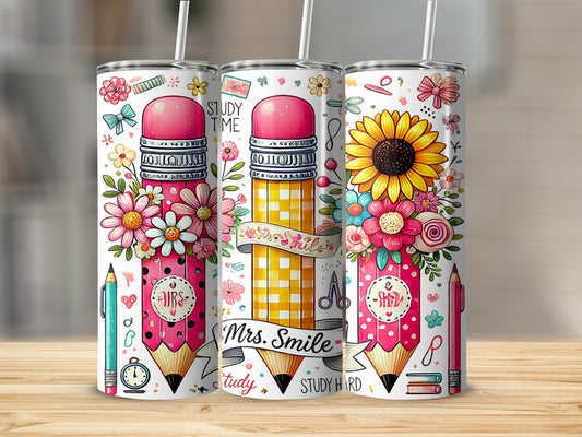 Three decorated tumblers shaped like pencils with floral and school supply designs.