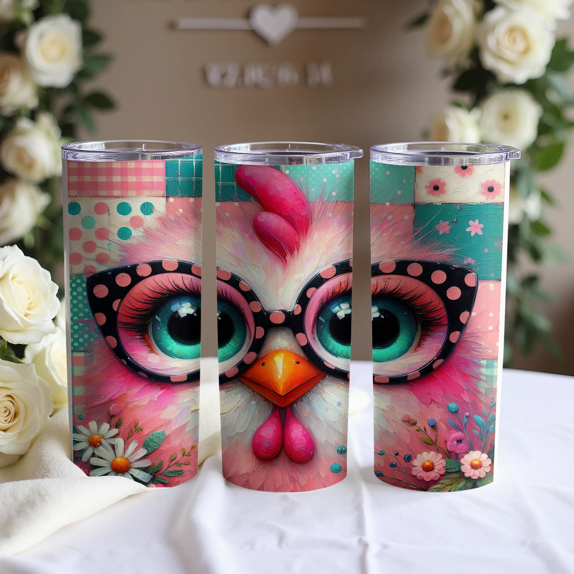 Three tumblers with a pink chicken design and floral accents.