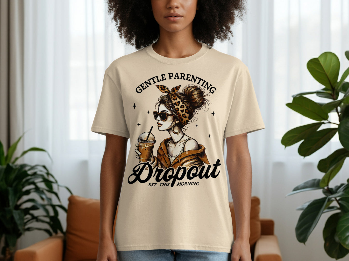 T-shirt with "Gentle Parenting Dropout" text and woman with iced coffee.