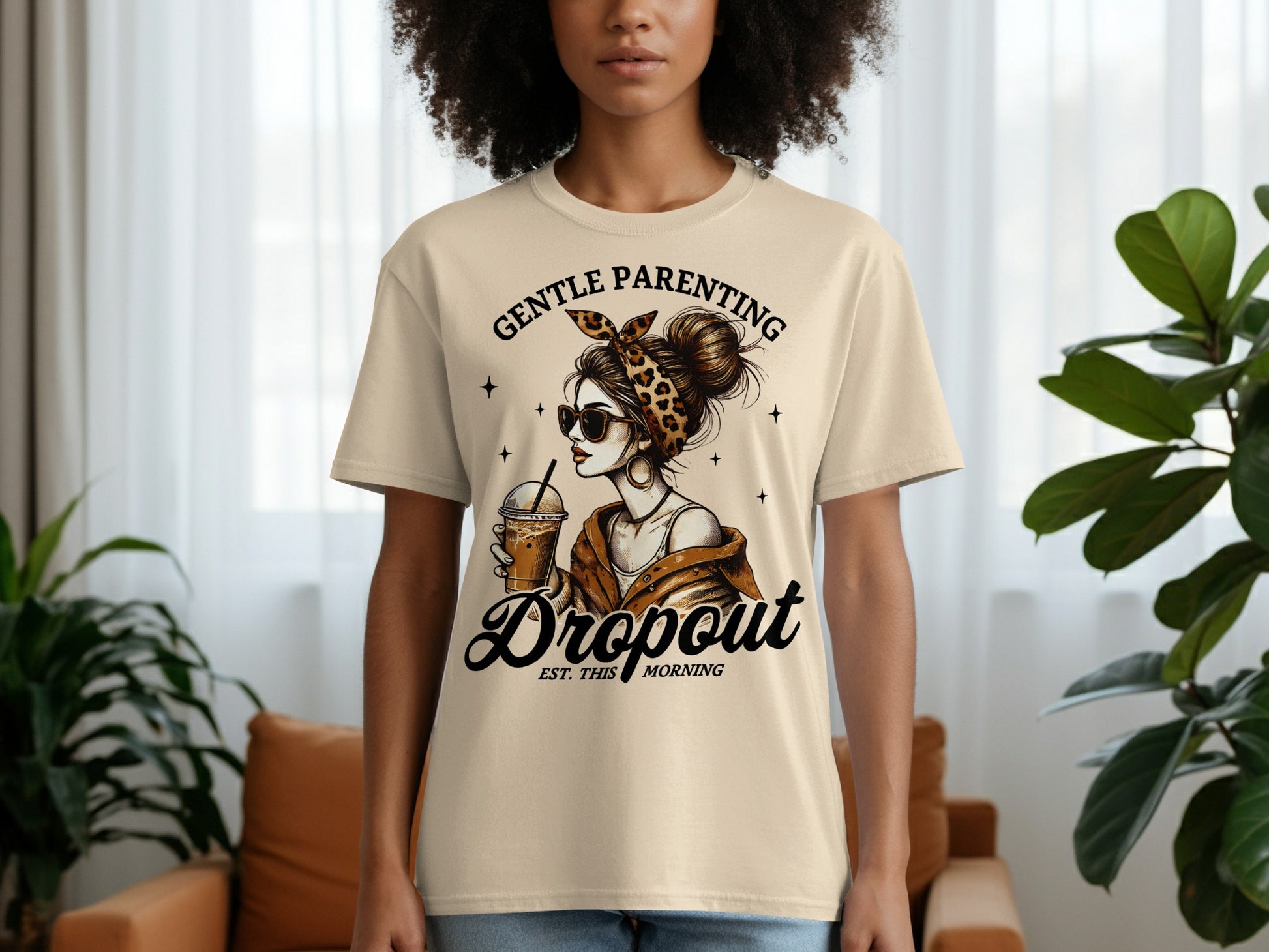 T-shirt with "Gentle Parenting Dropout" text and woman with iced coffee.