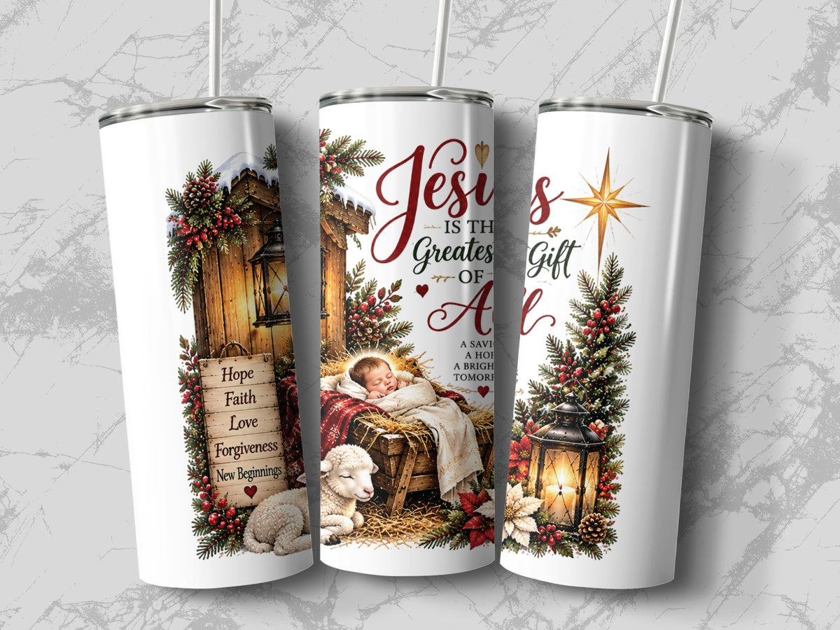 Three white tumblers with straws feature a Christmas nativity scene, a shining star, and text reading Jesus is the greatest gift of all.