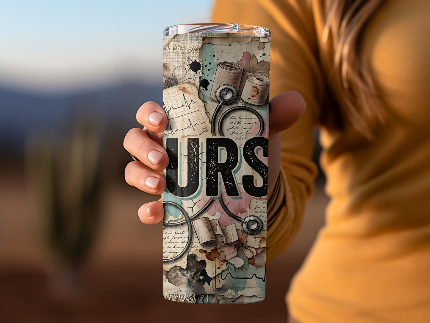 Tumbler with "NURS" text, stethoscope, and medical graphics.