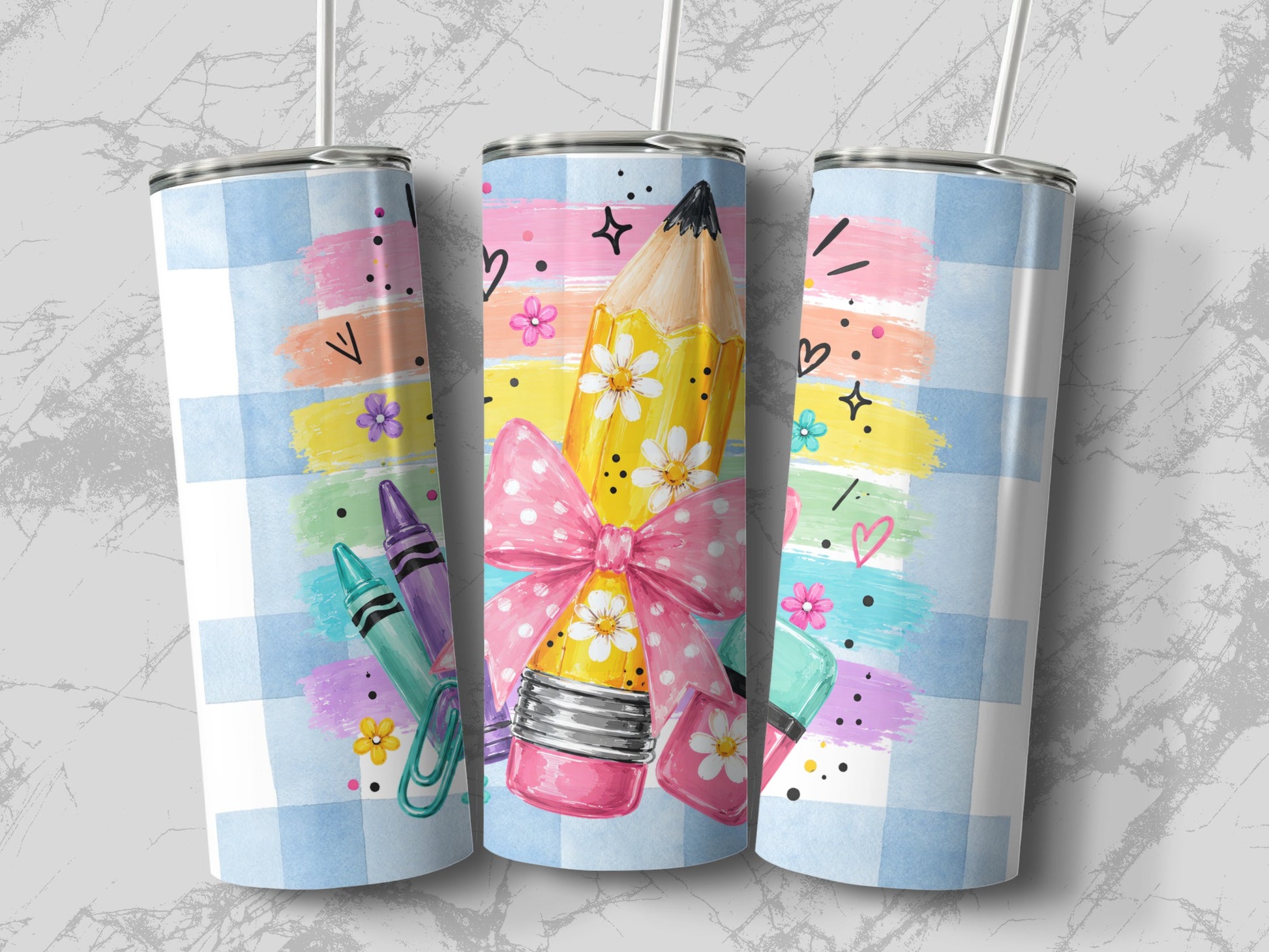 Three tumblers with a blue checkered pattern and school supply graphics.
