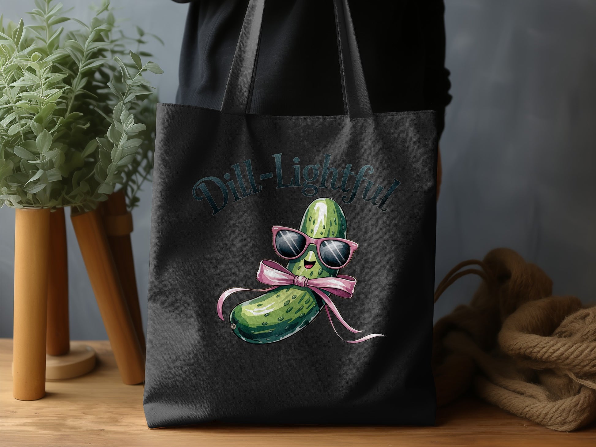 Tote bag with cartoon dill pickle wearing sunglasses and bow, "Dill-lightful" text.
