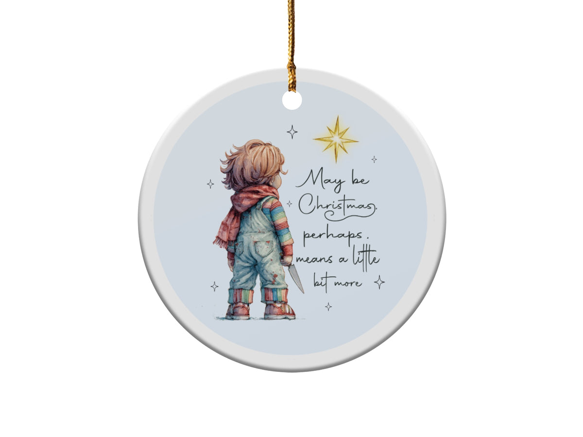 Round ornament with Chucky holding a knife and text "May be Christmas, perhaps, means a little bit more."