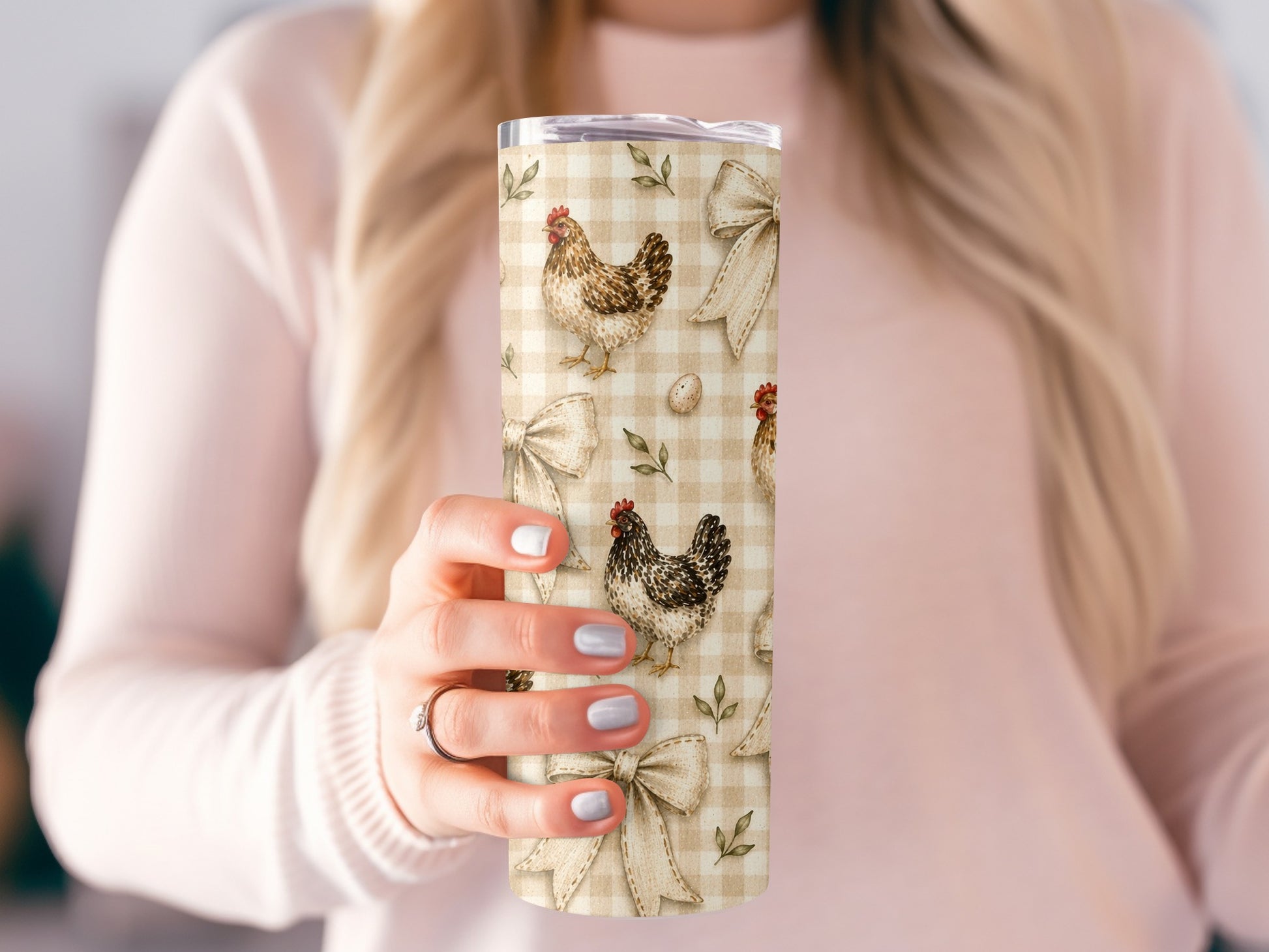 Tall tumbler with a rustic chicken, egg, and bow pattern on a checkered background.