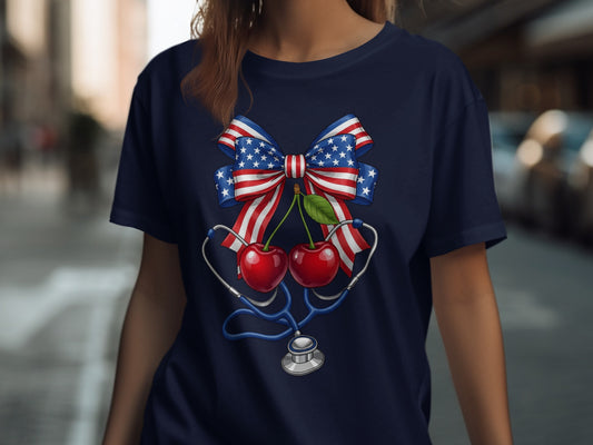 Stethoscope and cherries against a patriotic bow on a navy t-shirt.