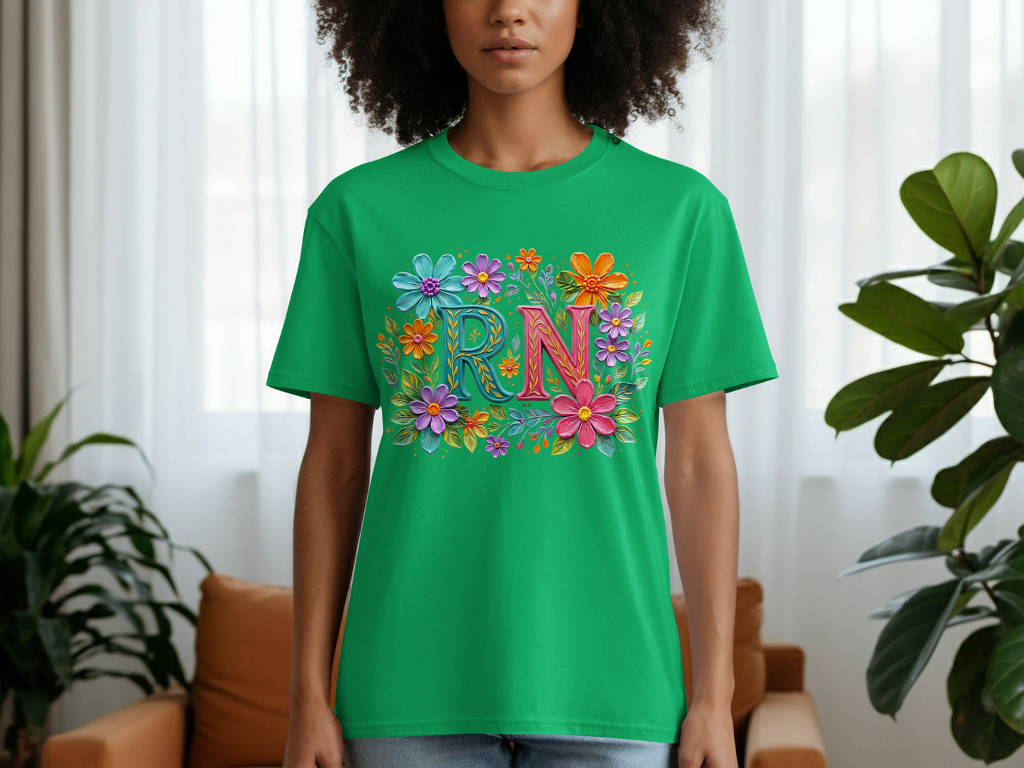Green t-shirt with "RN" in colorful floral letters.