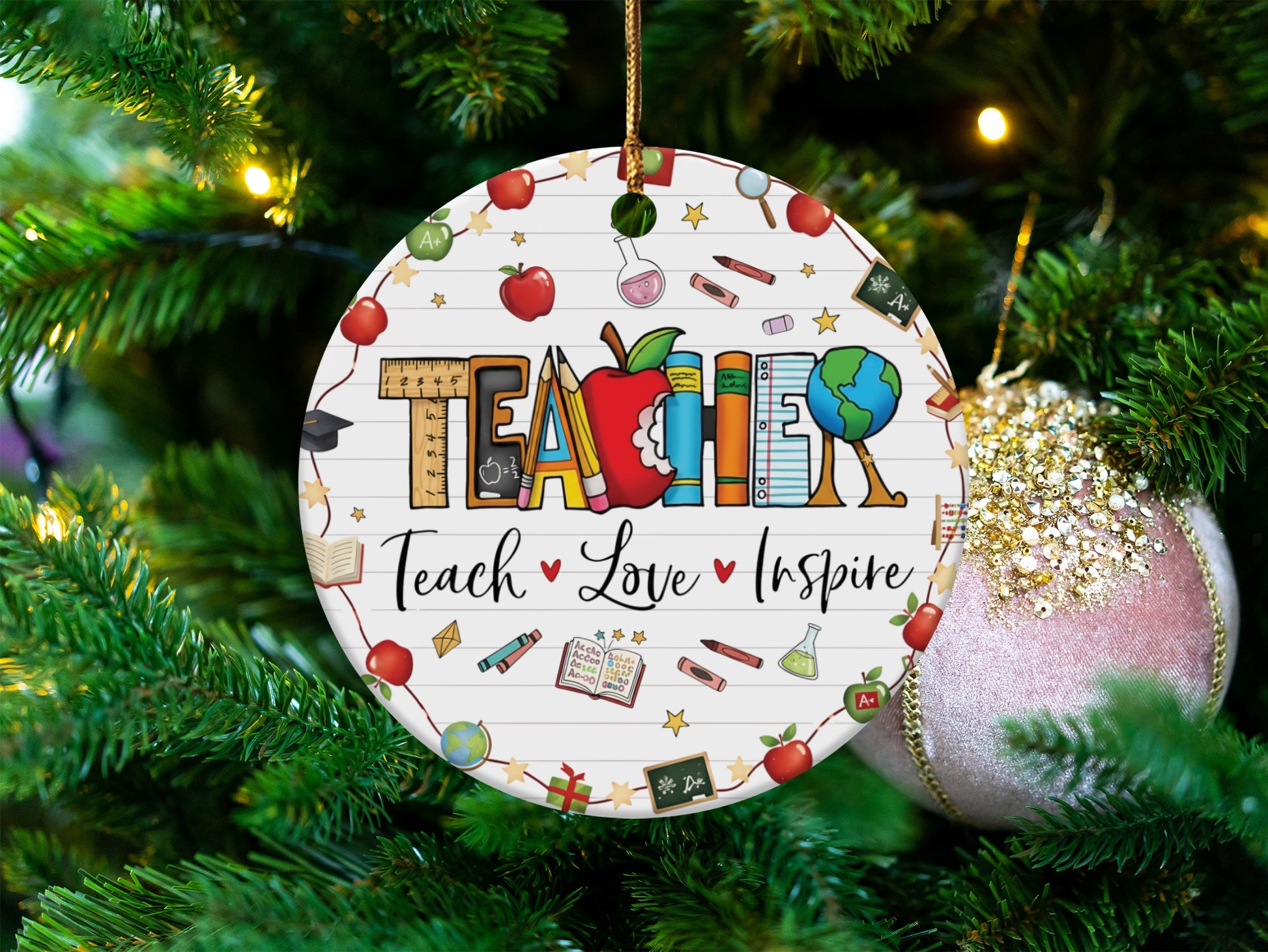 Round ornament with "TEACHER" text and school icons, reads "Teach Love Inspire".