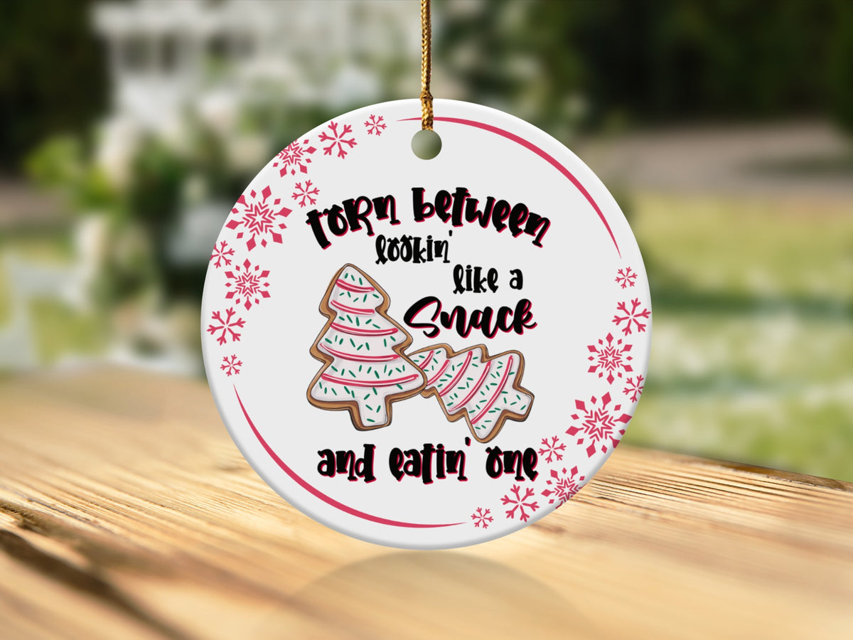 Ornament with text "Torn between lookin' like a snack and eatin' one."