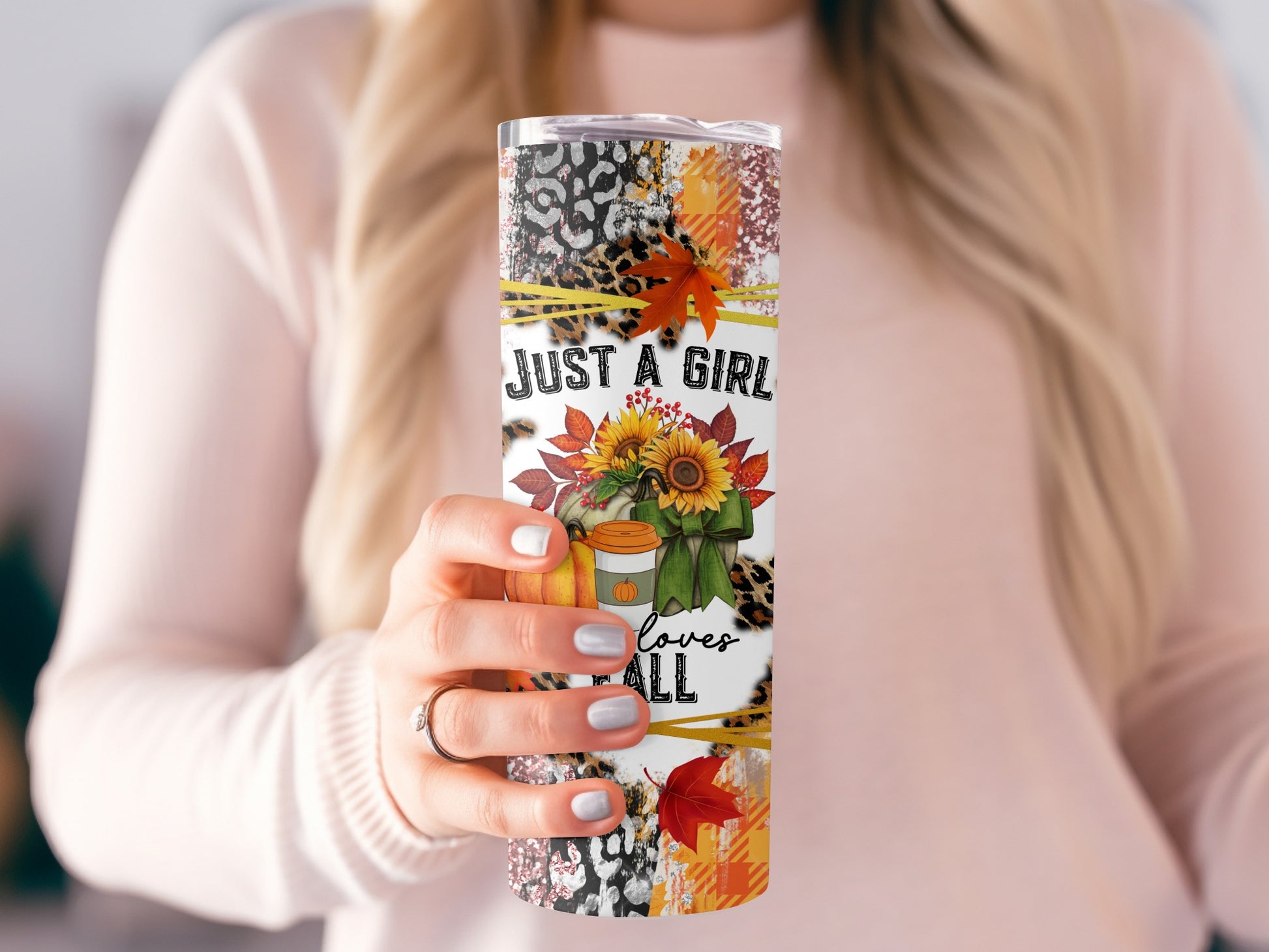 Tumbler with "Just a girl loves Fall" text, pumpkins, sunflowers, and leopard print.