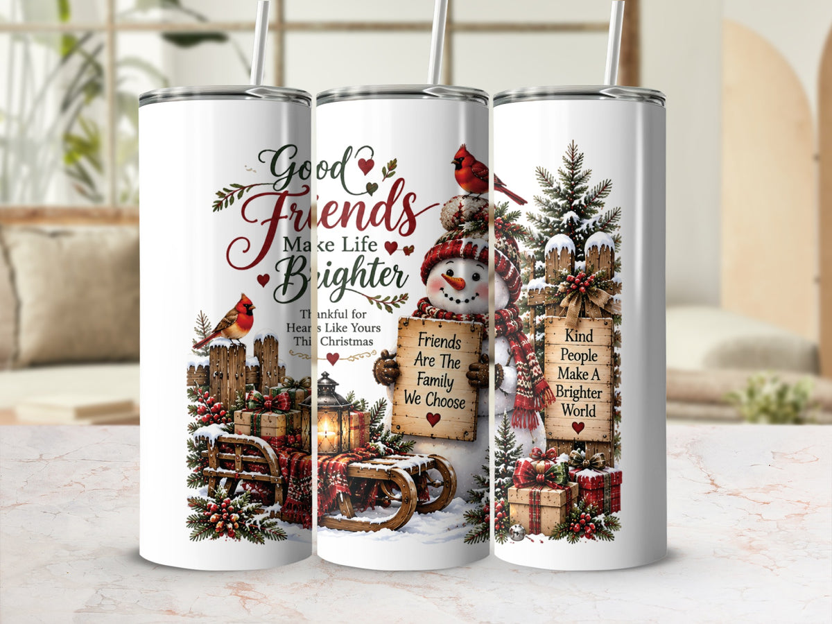 Three cylindrical white tumblers featuring a watercolor Christmas design with snowmen, cardinals, wrapped gifts, and friendship quotes.