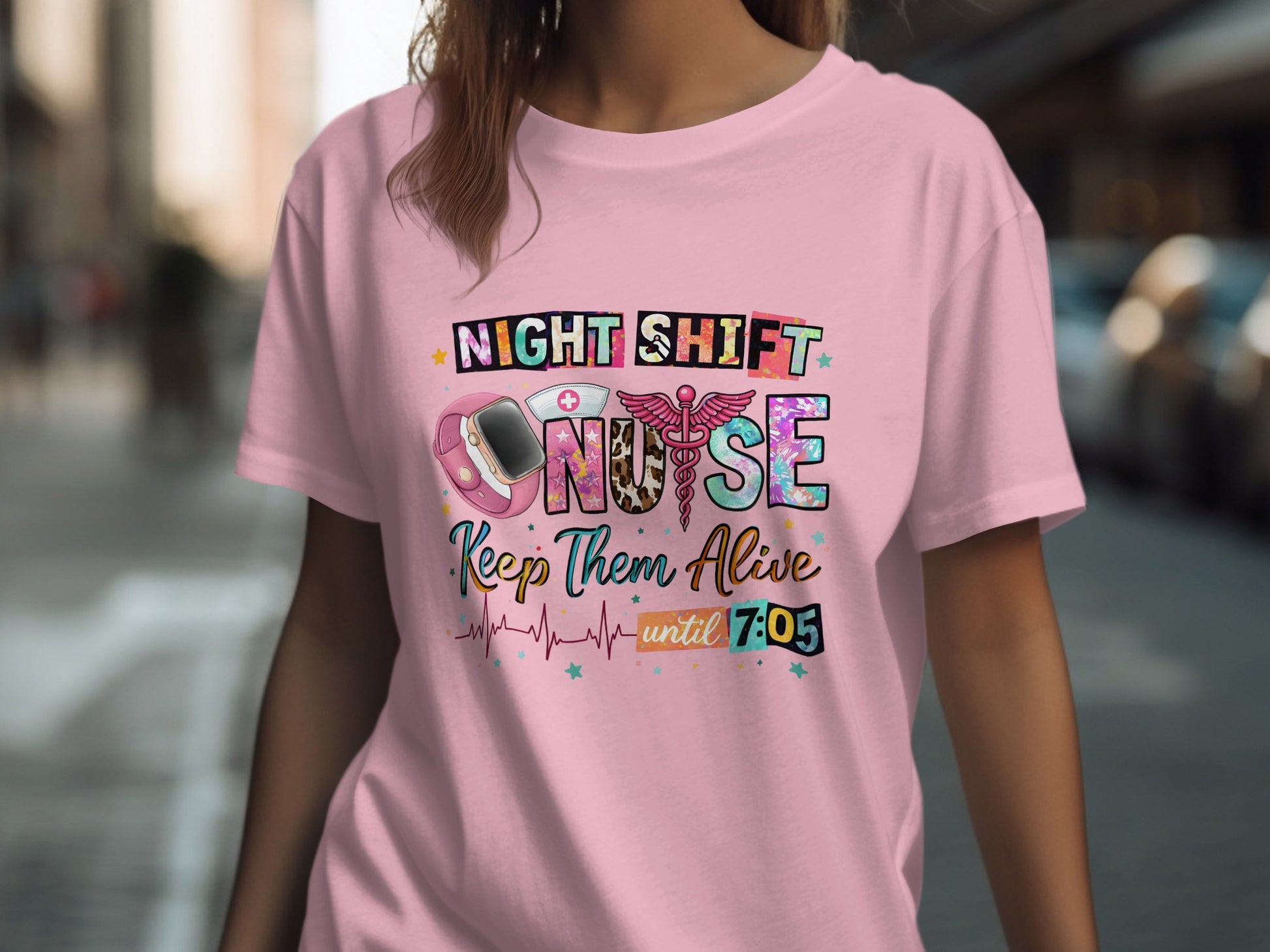Pink t-shirt with "NIGHT SHIFT NURSE" text, stethoscope, and clock at 7:05.