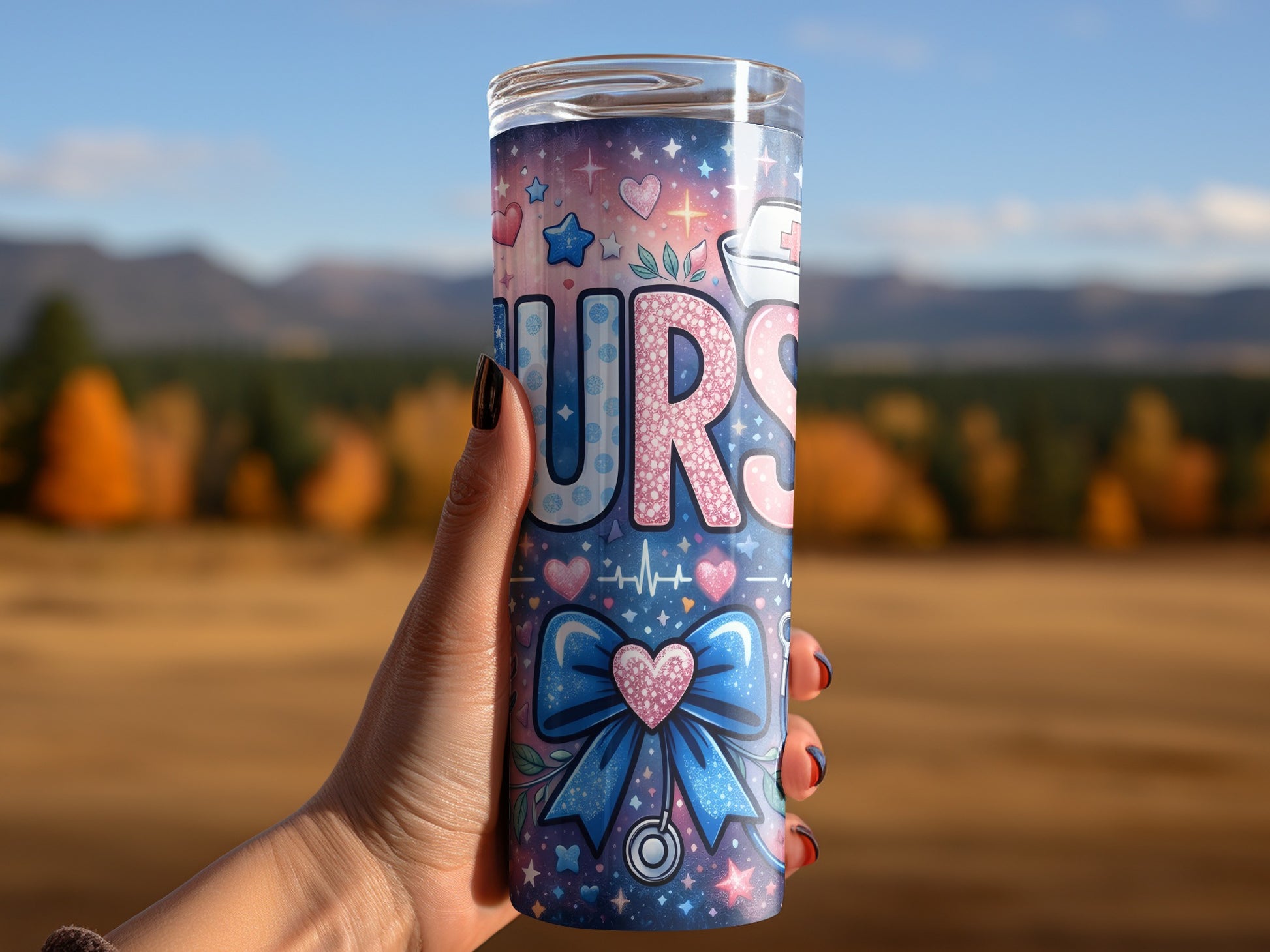 Nurse tumbler with bow, hearts, and stars on a blurred background.