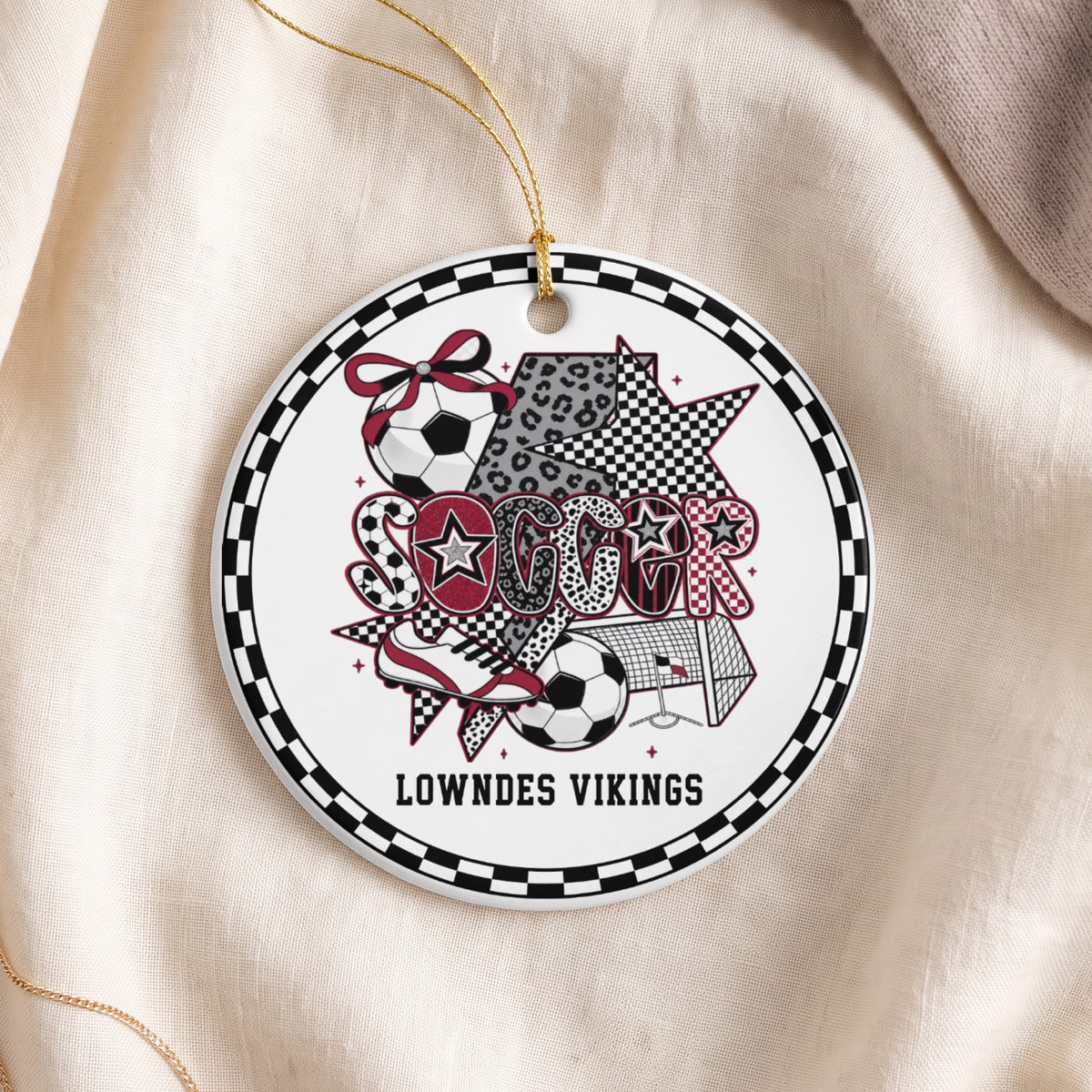 Round ceramic ornament with soccer graphics and "LOWNDES VIKINGS" text.