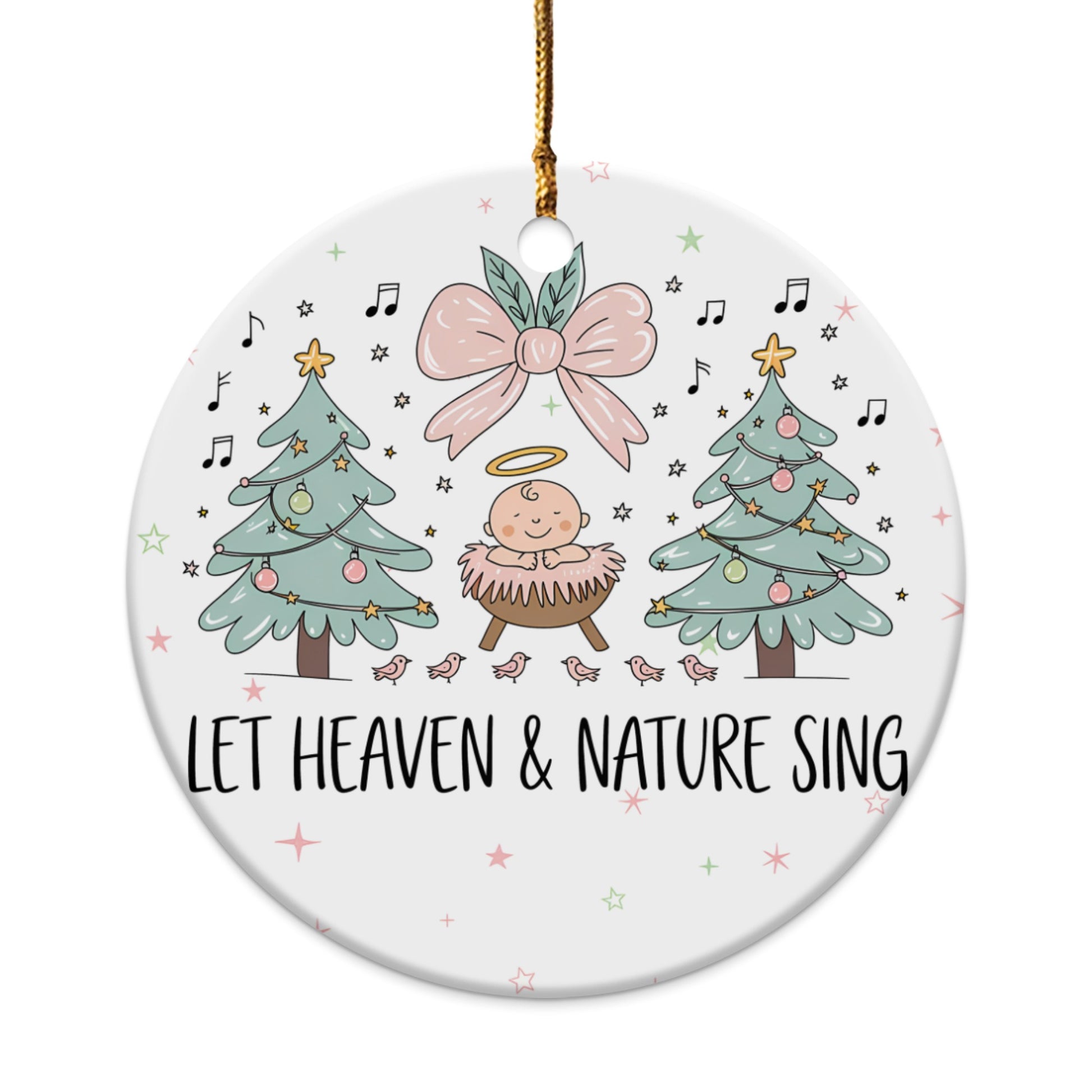 Christmas ornament with baby Jesus, trees, birds, and text "LET HEAVEN & NATURE SING."
