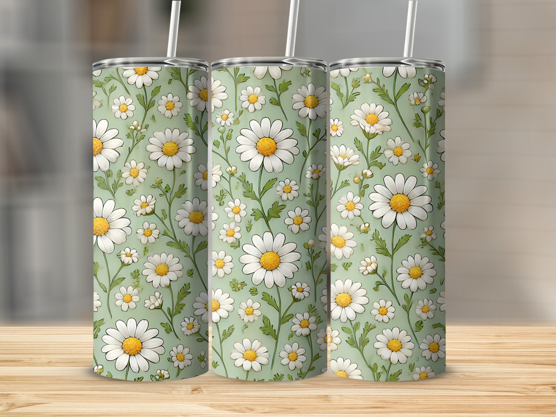 Three tumblers with a white daisy floral pattern on a light green background.