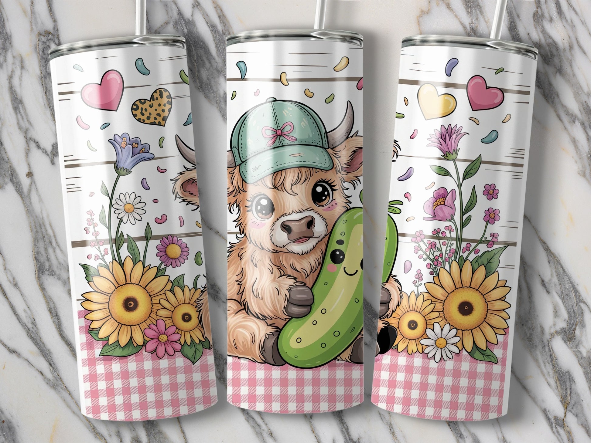 Cute cow with a pickle and sunflowers on a tumbler.