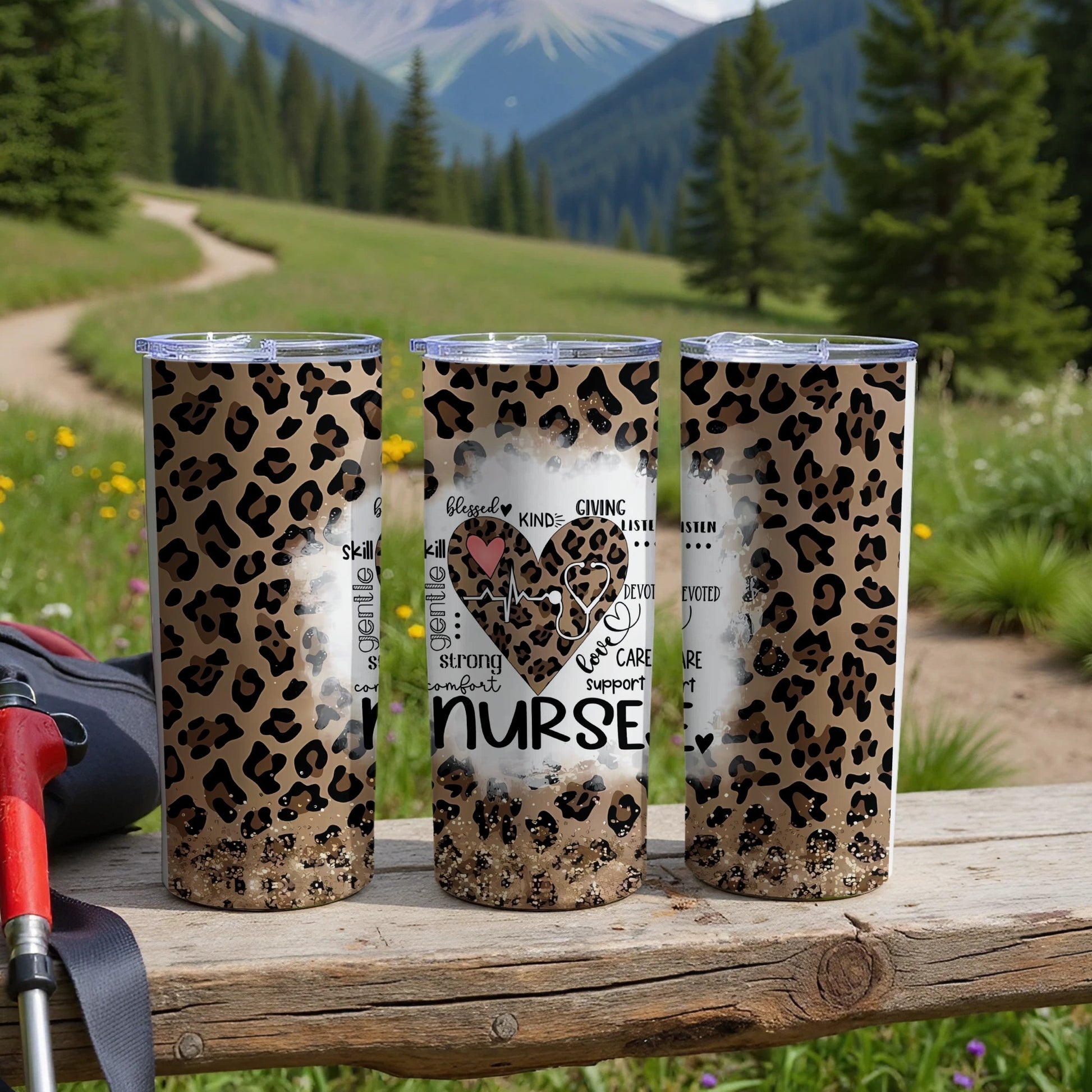 Three tumblers with leopard print and nurse-themed text, set outdoors.