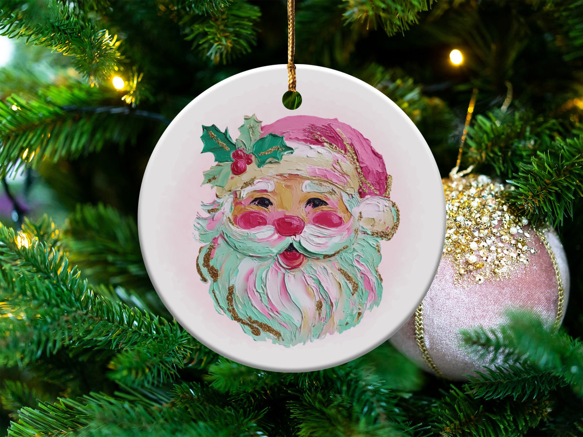 Round ceramic ornament with painted Santa face on a decorated Christmas tree.