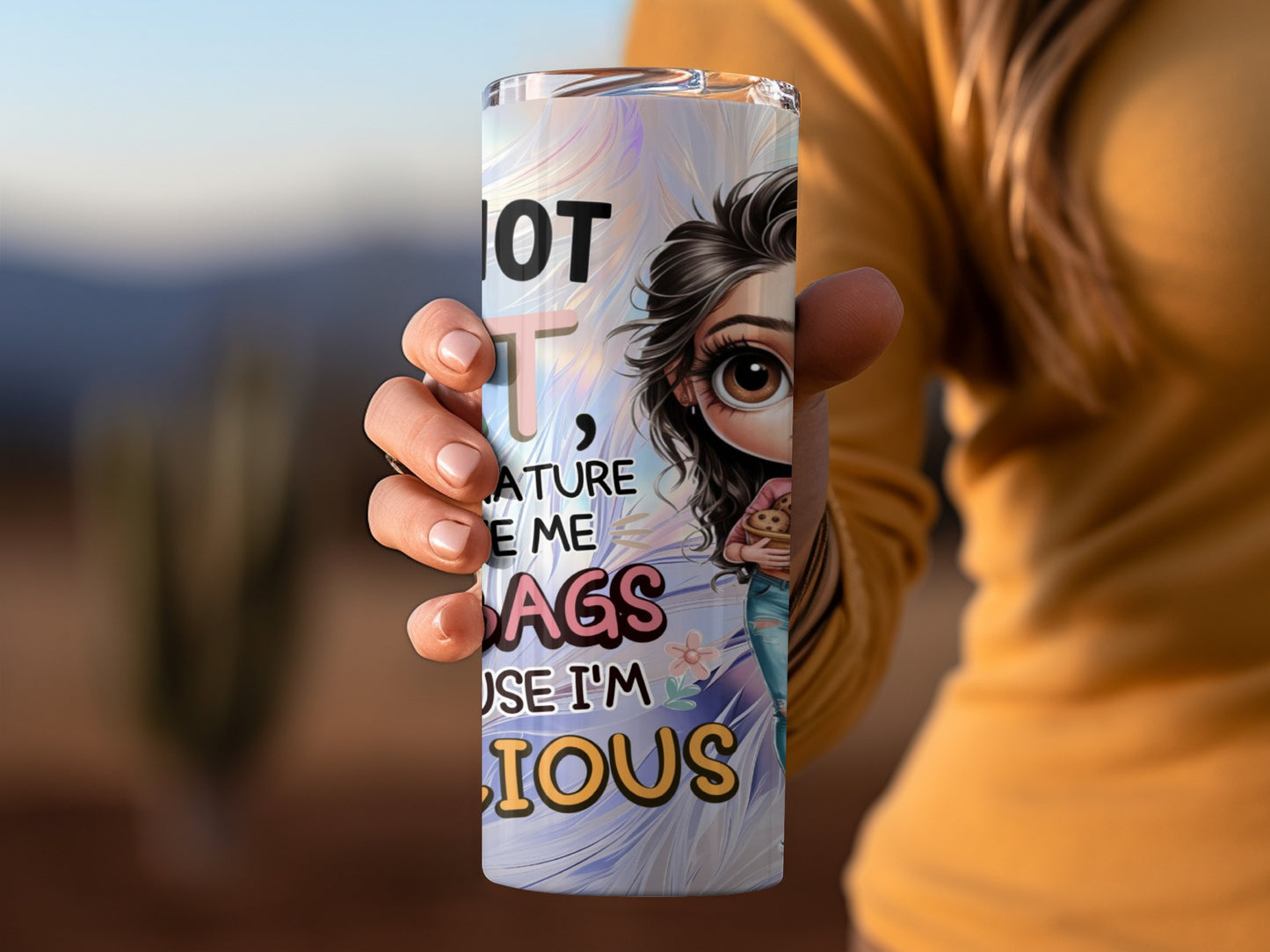 Tumbler with cartoon girl and text "NOT YOUR AVERAGE BAGS BECAUSE I'M SERIOUS".
