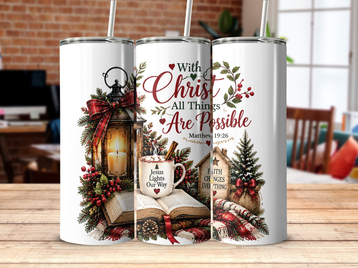 Three tall white travel tumblers featuring Christmas-themed Christian artwork, including a lit lantern, Bible, and text reading "With Christ All Things Are Possible."