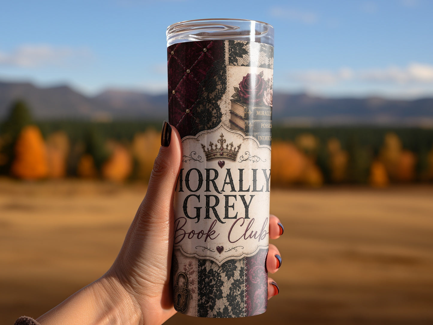 Tumbler with "Morally Grey Book Club" text and vintage book and floral designs.