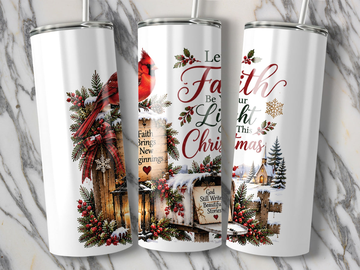 Three white metal tumblers featuring a Christmas design with cardinals, snow, pine branches, and inspirational text.