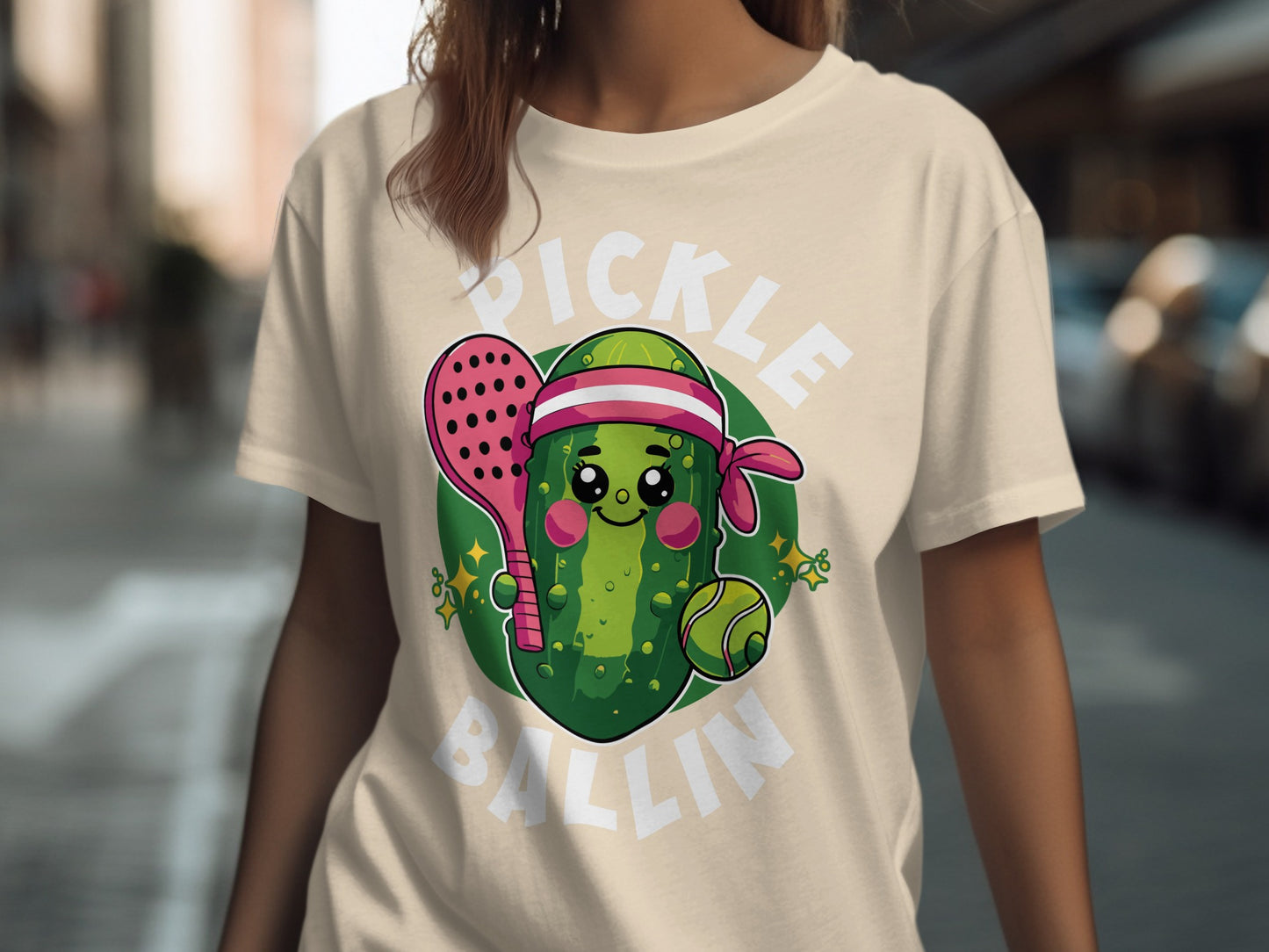 T-shirt with pickle character, paddle, ball, and "Pickle Ballin'" text.