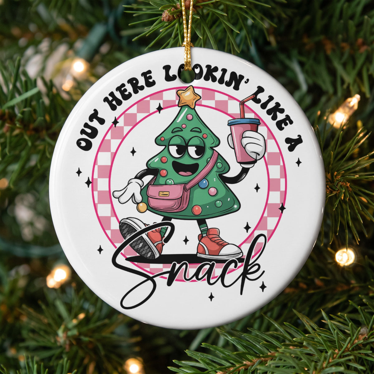 Ornament with cartoon Christmas tree saying "Out here lookin' like a snack."